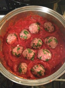 Here are 3 pounds of uncooked meatballs that I threw into the sauce.  OK I added a lot of parsely.