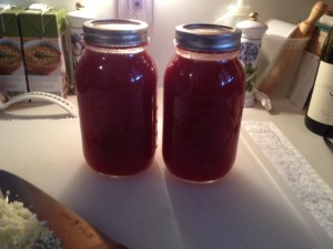 These are two of Lauren's mother-in-law's jars of home made tomato sauce.  I call it "Backyard Sauce" because it's made in the back yard during peak tomato season, late August and September.