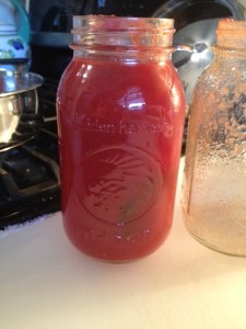 These jars of sauce were so delicious to me because they were tangy and I like the fresh sauce like that.  That's a basil leaf in the jar, they always jar the tomatoes with a basil leaf.