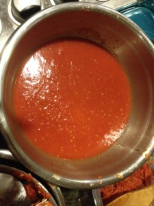 The tomato puree collected in the bowl.